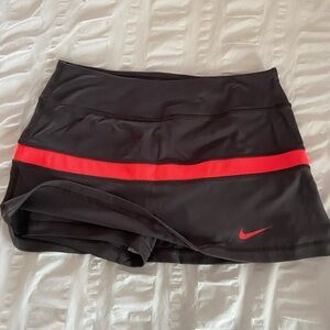 Dark gray skort with coral stripe